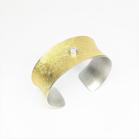 Bracelet en or jaune 22kt, argent et 1brillant. de 0,50ct
